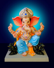 Ganesh sculpture, Lord Ganpati, Ganesha on Blue Background, Ganpati, happy Ganesh Chaturthi.