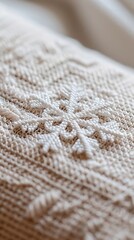 Empty meditation cushion with single snowflake