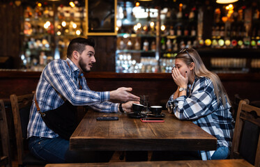 Bartender life. Two young bartenders argue about coffee taste and shifts in the workplace....