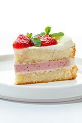 cakes with berries, chocolate and nuts on a white background