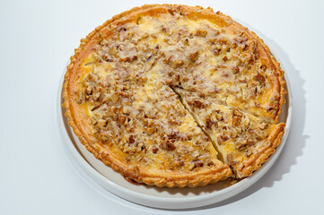 cakes with berries, chocolate and nuts on a white background
