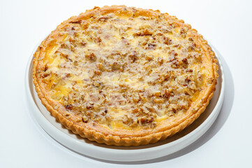 cakes with berries, chocolate and nuts on a white background