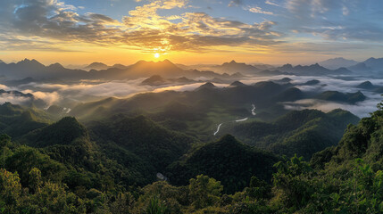 Obraz premium Dreamy Sunrise Over Misty Mountain Ranges With Flowing Rivers And Verdant Valleys
