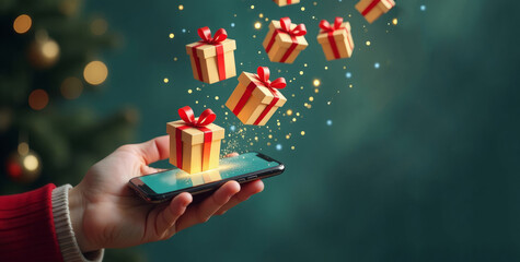 Phone in hand close-up background Christmas tree in blur. Painted Christmas gifts and holiday bokeh flying out of the green screen of the phone. Christmas sale, discounts