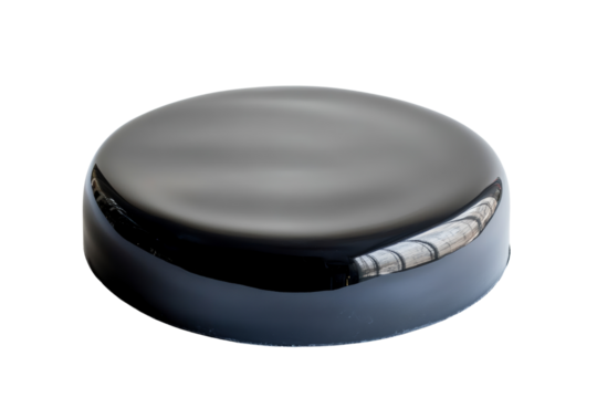 Glossy black hockey puck, isolated on a white background, perfect for sports illustrations and designs.