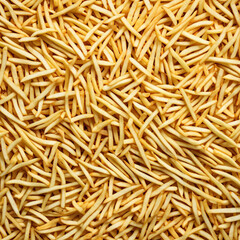 close-up of golden french fries piled in abundance with crispy edges and soft centers, stacked together in a mouthwatering display of delicious fast food favorites in warm golden tones