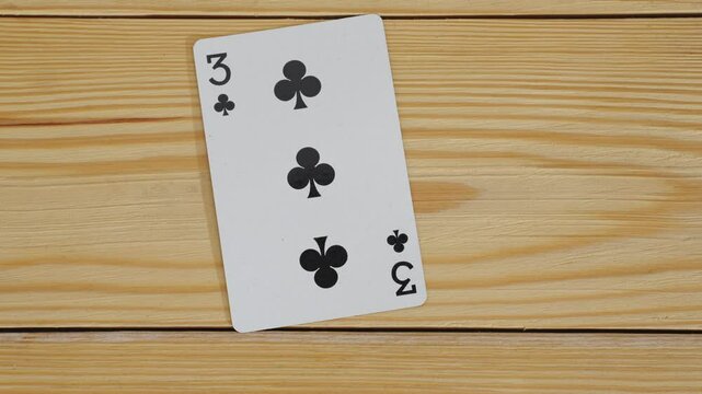 A winning combination of playing cards on a wooden background. card gambling. casino.