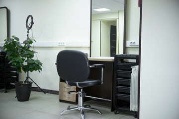 Barber's place is a mirror and an armchair. Beauty salon, rent.