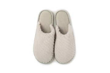 Soft slippers isolated on white background. Home slippers. Comfortable shoes for home. Foot care concept. Home comfort. Space for text. Copy space.