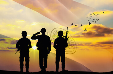 Silhouettes of soldiers with a background of the Paraguay flag and a sunset or sunrise. Concept of national holidays. Commemoration Day.