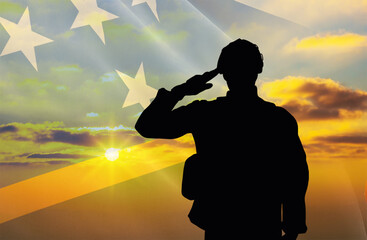 Silhouette of a soldier with a background of the Solomon Islands flag and a sunset or sunrise....