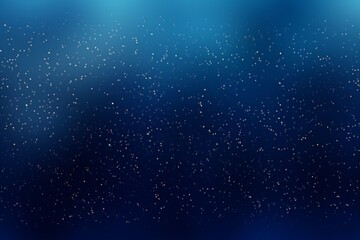 Fototapeta premium Abstract blue bokeh background. Defocused glitter lighting image for art and design.
