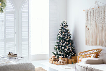 Cozy winter morning in a bright bedroom decorated for the holiday season