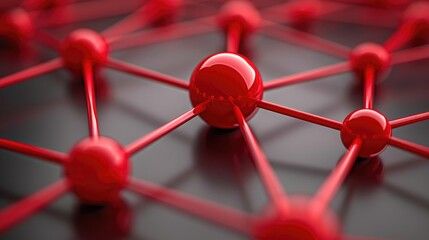 A close-up depiction of interconnected red spheres and lines, symbolizing network structures or molecular connections.