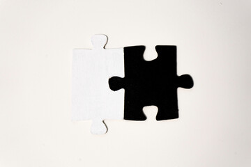 Jigsaw puzzle pieces isolated on white background. Black and white.