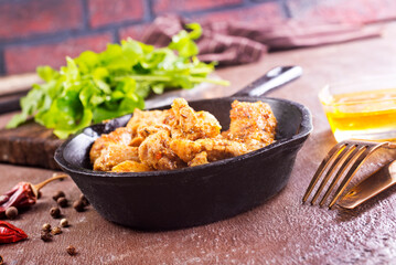 Fried chicken breast with spice and salt