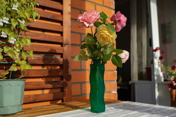 Bouquet of roses on the balcony
