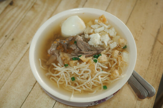 Batchoy also spelled batsoy, a Filipino noodle soup made of pork offal, pork cracklings, chicken stock, beef loin, and round noodles.