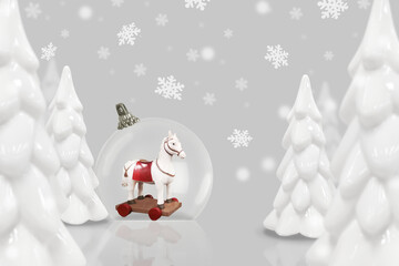 Christmas and New Year card with transparent ball, retro toy horse, trees, snowflakes, in white and gray colors