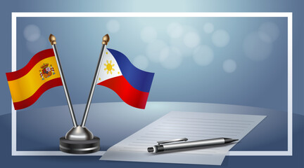 Spain and Philippines Small national flag on bokeh background, cooperative relationship
