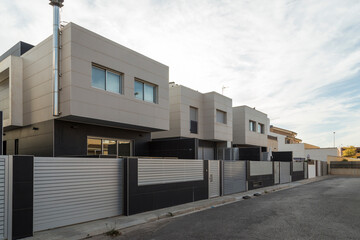 Street with modern houses, cubic shapes, contemporary architecture, very modern, luxury villas in Sagunto, Valencia, Spain