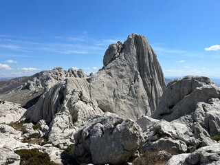 Rocky ridge of Tulove grede or karst mountain peak of Tulovice - Velebit Nature Park, Croatia (Stjenoviti greben Tulove grede ili krški planinski vrh Tulovice - Park prirode Velebit, Hrvatska)