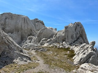 Rocky ridge of Tulove grede or karst mountain peak of Tulovice - Velebit Nature Park, Croatia (Stjenoviti greben Tulove grede ili krški planinski vrh Tulovice - Park prirode Velebit, Hrvatska)