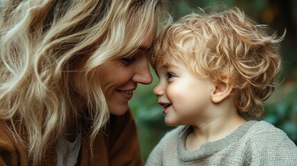 An intimate moment between a mother and her curly-haired toddler as they exchange adoring smiles, symbolizing the simplicity and beauty of family closeness in nature.