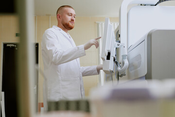Medical professional using modern diagnostic equipment in laboratory. This image features a focused...