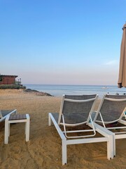 lounge chairs on a beach