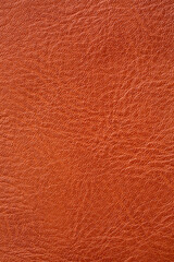 Brown synthetic leather macro background,Synthetic leather brown background texture. Brown leather textured background.