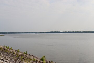 The peaceful lake in the countryside on a sunny morning.