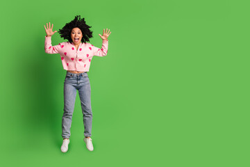 Fototapeta premium Full body photo of attractive young woman excited jump scream dressed strawberry print clothes isolated on green color background