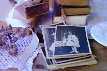 set old family photos in vintage interior, stack nostalgic sentimental pictures, photographs 50s,...