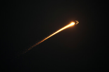 A single Glowing Firefly on a dark background