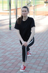 Woman doing workout exercises outside