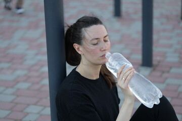 Woman doing workout exercises outside