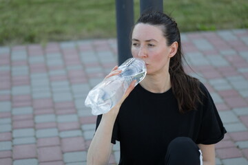 Woman doing workout exercises outside