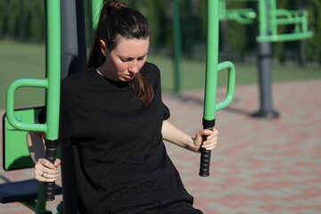 Woman doing workout exercises outside