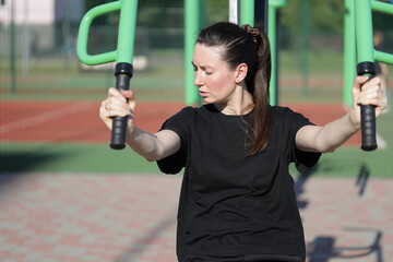 Woman doing workout exercises outside