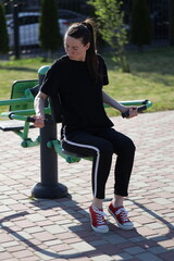 Woman doing workout exercises outside
