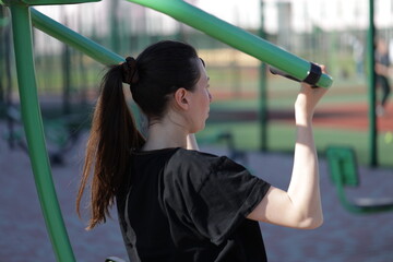 Woman doing workout exercises outside