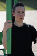 Woman doing workout exercises outside