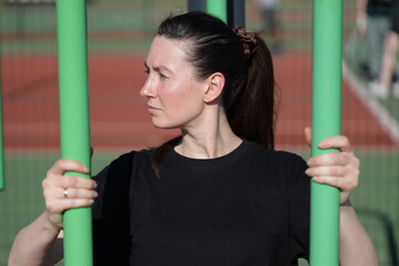 Woman doing workout exercises outside