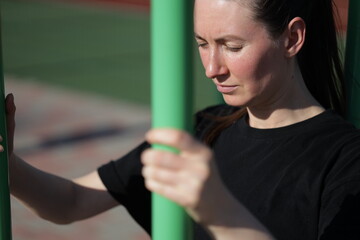 Woman doing workout exercises outside
