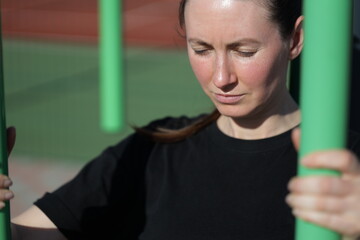 Woman doing workout exercises outside