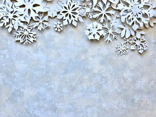Delicate white snowflakes on calming beige background create serene winter atmosphere, perfect for seasonal decorations or holiday themes
