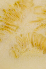 cut yellow ripe pumpkins on the table in close-up
