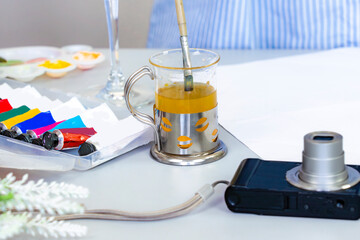 Arts Painting Elements Watercolor brushes, canvas on a table with blur female artist