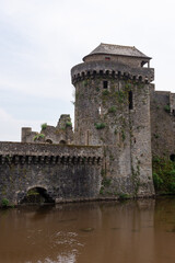 The Coigny tower of the Fougeres medieval castle with the Le Nançon river in foreground (Fougeres, Ille-et-Vilaine, Bretagne, France) 